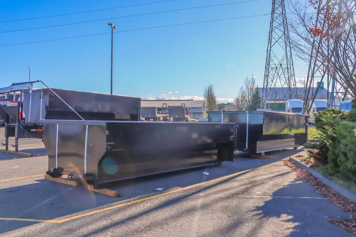 Roll-off dumpster ready for waste disposal at job site for 2 Yard Dumpster Rental in Short Pump